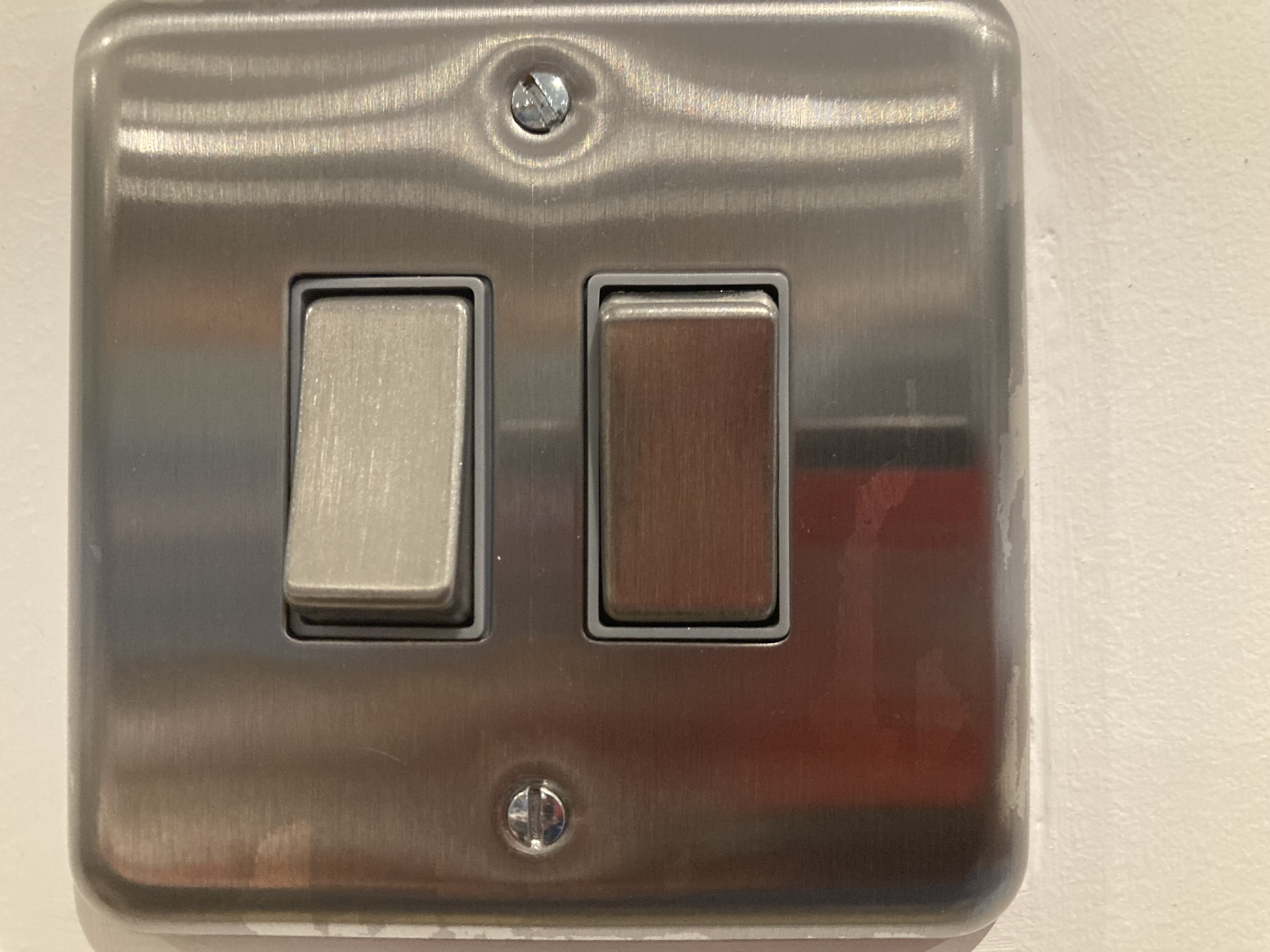 Paint Damaged Brushed Steel Switch - Bright Spark Electrician